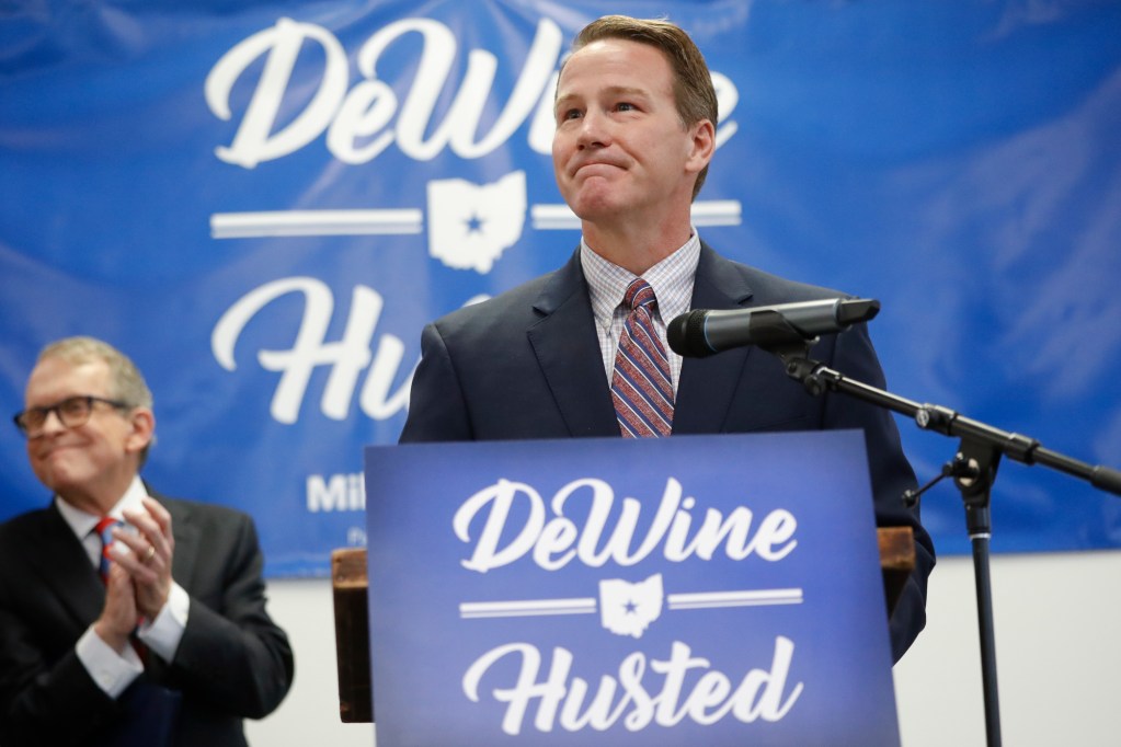 Jon Husted speaks alongside Mike DeWine during a 2017 news conference to announce their decision to share the ticket in their bid for the Ohio governorship.