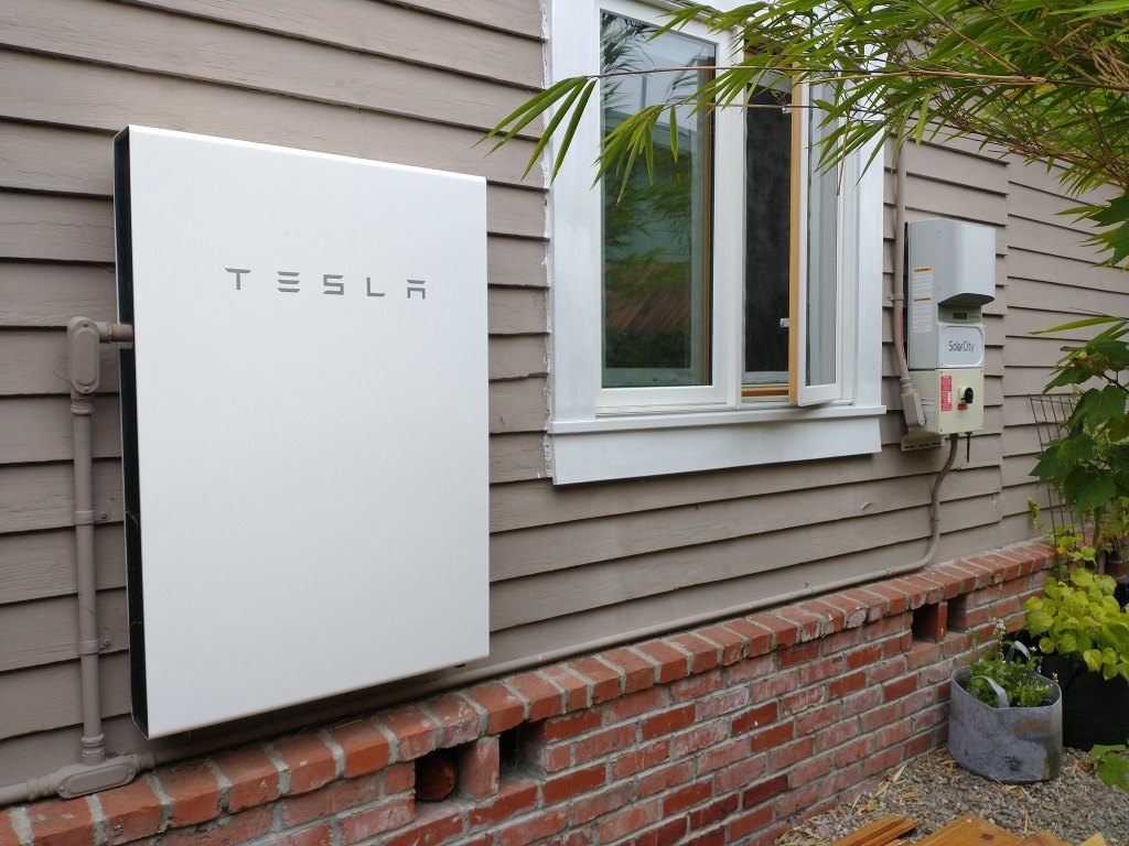 A Tesla Powerwall battery storage system mounted on the outside of a California home.